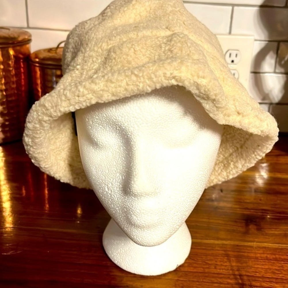Fuzzy ladies bucket hat. Adjustable strap inside. New approx 22 inches around